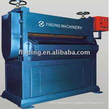 Embossed pattern forming machine